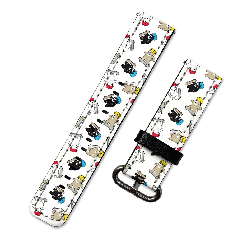 May include: White leather watch band with a repeating pattern of cartoon bears wearing helmets and riding skateboards. The band is shown in two pieces, one with the buckle and one without.