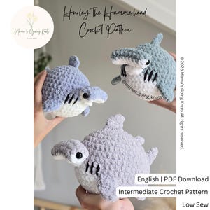 May include: Three plush hammerhead shark toys made of gray and white yarn with black safety eyes and stitched gill details. The text reads Hurley The Hammerhead Crochet Pattern, Mama's Going Knots, and English | PDF Download Intermediate Crochet Pattern.