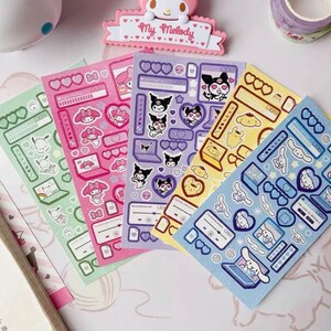 May include: Four sheets of colorful stickers featuring cartoon characters. The stickers are on a white background. The characters include a pink cat with a bow, a black cat with a crown, a yellow dog with a bow, and a white dog with a bow. The stickers are labeled "My Melody" and "Kuromi".