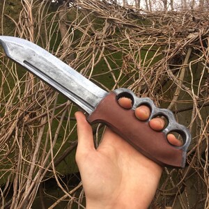 Brass knuckles? Check. Weird blades? Check. Spikes? Check. Zombies