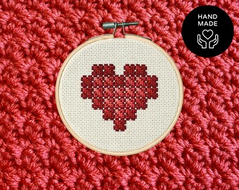 zoom on a cross stitched heart