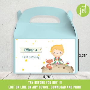 May include: A light blue favour box with a white label featuring a cartoon illustration of The Little Prince with a fox. The label also includes the text "Oliver's First Birthday" and yellow stars. The box measures 14.6 cm wide by 8.3 cm tall.