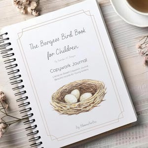 May include: A spiral-bound journal titled The Burgess Bird Book for Children by Thornton W. Burgess, featuring a Copywork Journal subtitle and a watercolor illustration of a bird nest with three white eggs, with the text By BloomsForBee.