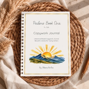 May include: A spiral-bound copywork journal titled Psalms Book One The Bible Copywork Journal Literature-Based Copywork Journal Beautiful Words for Young Writers By BloomsForBee with a watercolor illustration of a sunrise over blue mountains.