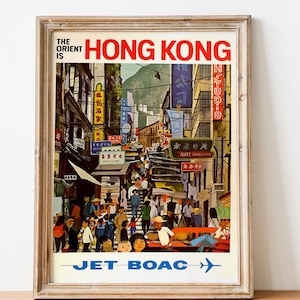 May include: Vintage travel poster advertising a trip to Hong Kong with Jet BOAC. The poster features a colorful illustration of a bustling street scene with people walking and shops with Chinese characters.