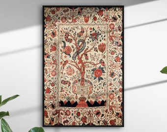 May include: Framed vintage-style tapestry featuring a central tree design with red and pink flowers, set against a cream background. The artwork is framed in a black border and is displayed on a white wall.