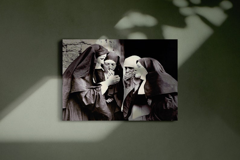 May include: A black and white photograph of four nuns in habits, standing together and smoking cigarettes.
