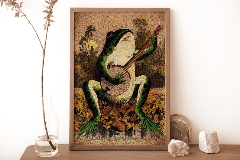 Puede incluir: Una ilustraci&oacute;n vintage de una rana verde tocando un banjo en un entorno de bosque. La rana est&aacute; sentada en un tronco con las piernas cruzadas y los ojos cerrados. El banjo es marr&oacute;n con una cuerda blanca.
