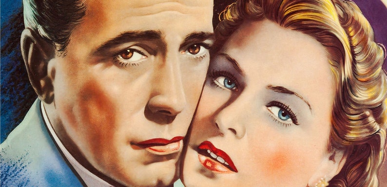 May include: Vintage illustration of a man and woman in a close embrace. The man has dark hair and brown eyes, while the woman has blonde hair and blue eyes. Both have red lips. The artwork is in a classic, romantic style.
