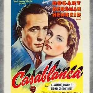 May include: Vintage movie poster for the film "Casablanca." The poster features Humphrey Bogart and Ingrid Bergman, with the film's title in large red script. The poster includes the Warner Bros. logo and other text.