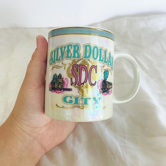 Vintage travel silver dollar city mug with iridescent color Etsy