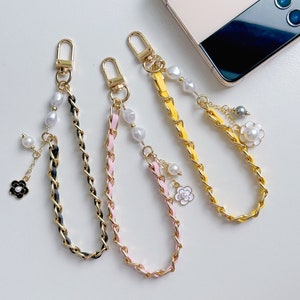 Correa para teléfono, cadena y pulsera tejida de piel sintética, cordón con flor de perla sintética y parche para conectar el teléfono, correa para bolso y llavero.