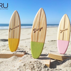 Handmade customizable miniature surfboard.