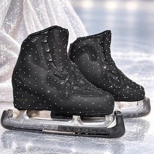 May include: A pair of black ice skates featuring a high-top boot design covered in small, reflective white dots. The skates have black laces, a structured ankle support, and silver-toned metal blades with the word Matrix engraved on the side.