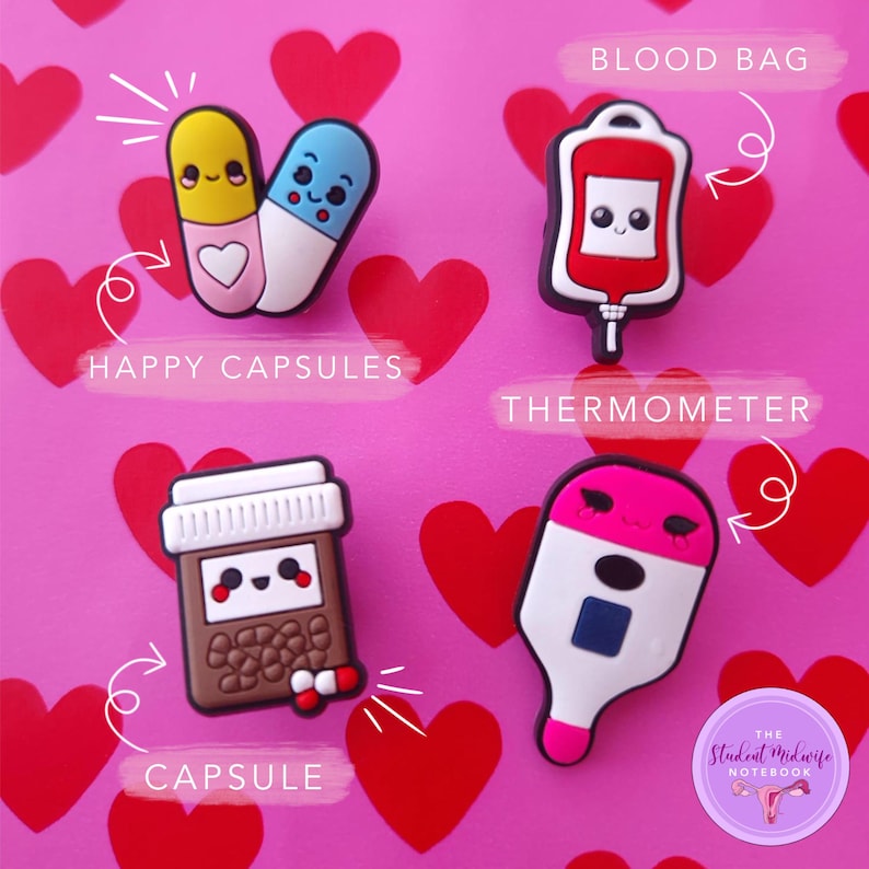 May include: Four colorful medical-themed shoe charms with cute faces. The charms include a blood bag, a thermometer, a pill bottle, and two pills. The charms are on a pink background with hearts.