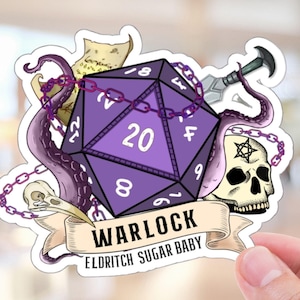 May include: Purple 20-sided die with a chain wrapped around it, a skull with a pentagram, an octopus tentacle, and a dagger. The die is surrounded by a banner that reads "Warlock Eldritch Sugar Baby".