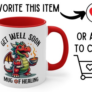 May include: White ceramic mug with a red rim. The mug features a cartoon illustration of a red dragon holding a potion and a scroll. The text "Get Well Soon" is written in a circle around the dragon. Below the dragon is the text "Mug of Healing" with a 20-sided die.
