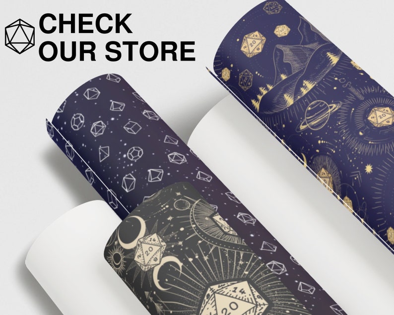 May include: Three different patterned wrapping paper rolls with a celestial theme. The patterns feature dice, stars, moons, and planets in gold and white on a dark blue background.