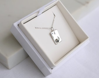 Sterling Silver Black Diamond pendant with a lightly hammered texture