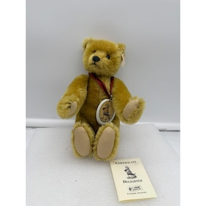 May include: A set of three ceramic mugs with a speckled, matte finish. The mugs are in shades of cream, light gray, and dark gray. Each mug has a simple, minimalist design, perfect for coffee or tea.