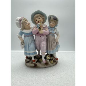 Vintage Bisque Porcelain Figurine Three Children Flowers