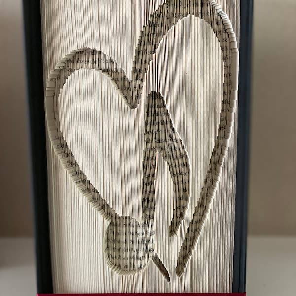 Music note in heart book folding pattern