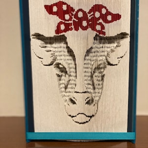 Cow with bandana book folding pattern