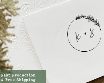 May include: A white card with a black and white illustration of a circle with a sprig of greenery and the text "k + s" inside. The text "Fast Production & Free Shipping" is printed in green at the bottom of the card.