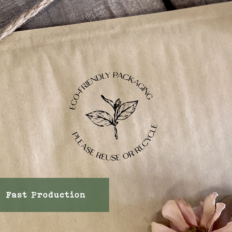 May include: A brown paper envelope with a black and white stamp that reads "Eco-Friendly Packaging Please Reuse or Recycle". The stamp features a simple illustration of a plant with leaves.