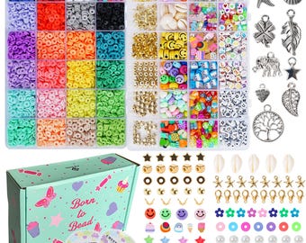May include: A crafting kit with a variety of colorful beads, charms, and accessories. The kit includes round and flat beads in various colors, smiley face beads, letter beads, and charms. A box with the text "Born to Bead" is also included.