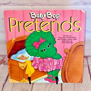 Baby Bop Pretends Softcover Book Written by Mary Ann Dudko, Ph.D. and Margie Larsen, M.Ed. Illustrated by June Valentine | Read Details