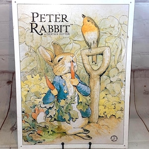 Peter Rabbit By Beatrix Potter Metal Sign Frederick Warne & Co. 1997 | 12" x 16" |