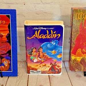 Disney&#39;s Aladdin Bundle | Includes VHS, Hardcover Book and 100 Piece Puzzle | See Photos and Read Details