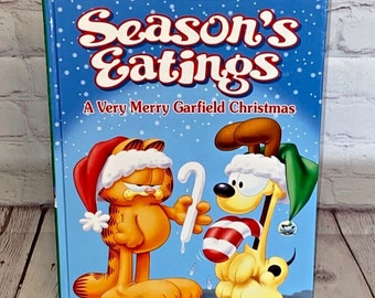 Season's Eatings « Un très joyeux Noël Garfield » de Jim Davis | Livre à couverture rigide de Ballantine Books 2003 | Voir toutes les photos et lire !