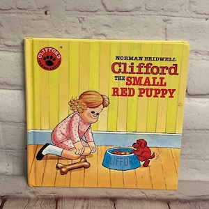Norman Bridwell&#39;s &quot;Clifford The Small Red Puppy&quot; by Scholastic 1985 | Hardcover Children&#39;s Book |  Writing on the Inside Cover