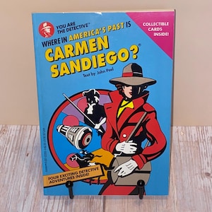 Où se trouve Carmen Sandiego dans America&#39;s Past ? Chapitre de John Peel 1992 | Cartes de collection non incluses | Voir les photos et lire les détails