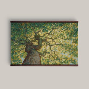 May include: An upward view of a large tree with a thick, textured trunk and sprawling branches. The tree's leaves are a mix of green and yellow, suggesting sunlight filtering through. The artwork is framed in a dark brown wooden frame.