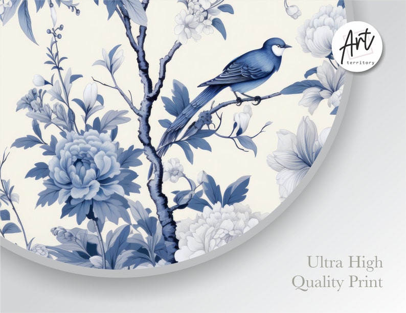 May include: A round, white canvas print with a blue and white floral design. A blue bird is perched on a branch in the center of the print. The text "Art Territory" is in the upper right corner of the print.