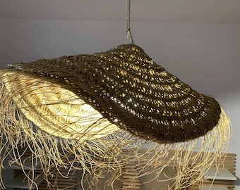 Large parasol pendant made of palm leaves