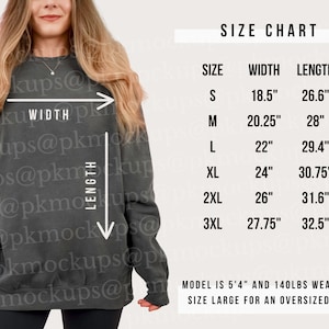 May include: Size chart for a sweatshirt in charcoal grey. The chart shows the width and length measurements in inches for sizes S, M, L, XL, 2XL, and 3XL. The text "MODEL IS 5'4" AND 140LBS WEARING A SIZE LARGE FOR AN OVERSIZED LOOK" is also included.
