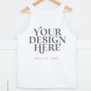 May include: White tank top with the text "YOUR DESIGN HERE" and "BACK OF TANK" printed on the back.