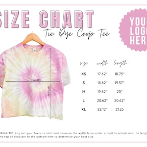 May include: Size chart for a tie dye crop tee. The chart shows the width and length in inches for sizes XS, S, M, L, and XL.