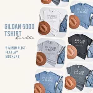 May include: A flatlay mockup showcasing five Gildan 5000 t-shirts in different colours, alongside jeans and brown hats. Each shirt has the text "PARKER & KANE mockups". The image also includes the text "GILDAN 5000 TSHIRT bundle" and "5 MINIMALIST FLATLAY MOCKUPS".