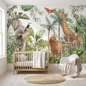 May include: A nursery room featuring a wall mural with watercolor illustrations of a gray elephant, a brown giraffe, a lion, a toucan, a parrot, and a monkey amidst green jungle foliage. A wooden crib, a white rocking chair, and a round rug.