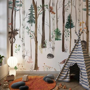 May include: A wall mural featuring a watercolor forest scene with birch and pine trees, a moose, a squirrel, and a hedgehog. In the room, a blue and white striped teepee sits on a round orange rug, accompanied by wooden toys and a white lamp.