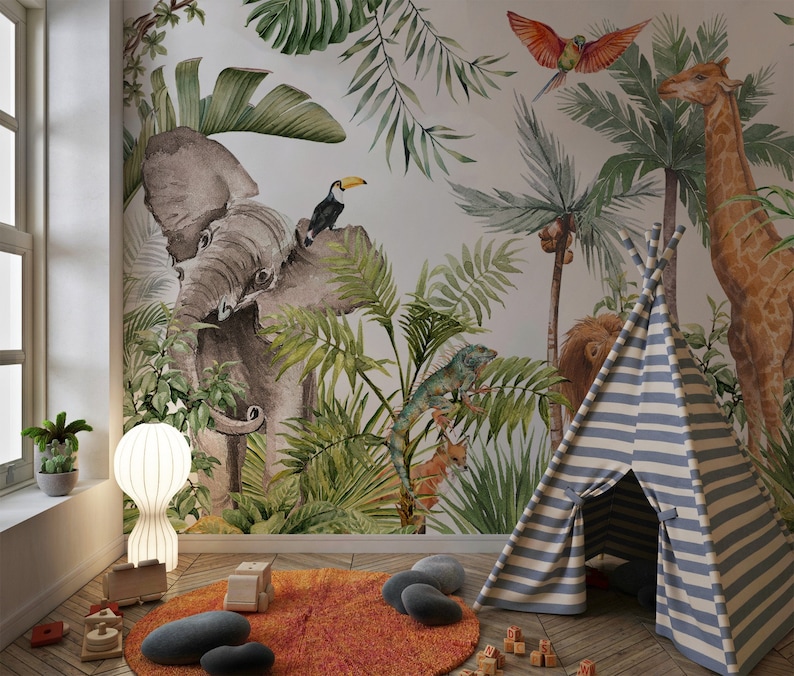May include: A wall mural featuring a jungle scene with an elephant, giraffe, toucan, iguana, and parrot. In the room, a blue and white striped teepee tent sits on a wooden floor with a round orange rug, wooden toy blocks, and a white lamp.
