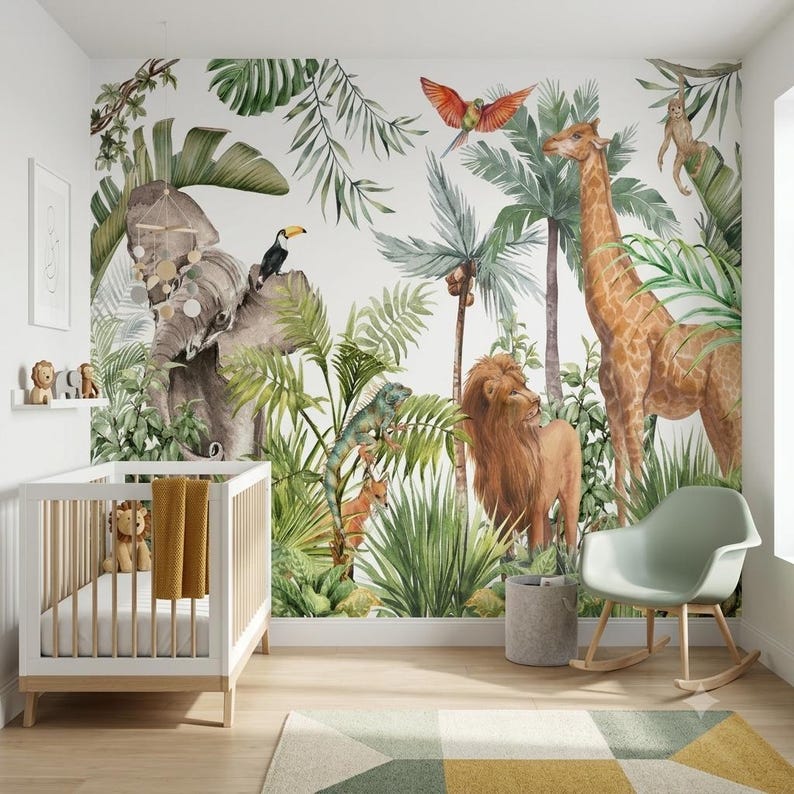 May include: A nursery room featuring a large wall mural of a jungle scene with a gray elephant, a tall giraffe, a lion, a toucan, a parrot, and a monkey amidst green palm leaves. A white wooden crib with a yellow blanket and a light green rocking chair.