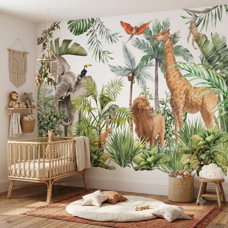 May include: A nursery room featuring a wall mural of a jungle scene with a giraffe, lion, elephant, toucan, and parrot among palm leaves. The room includes a light wood crib, a round cream rug with star-shaped pillows, and a woven basket.