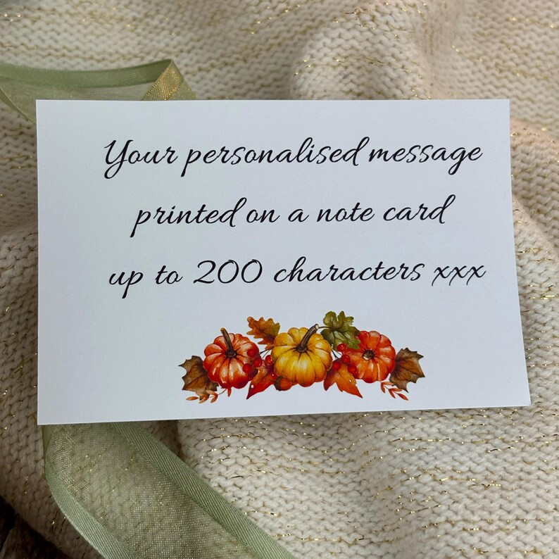 May include: A white note card with the text "Your personalised message printed on a note card up to 200 characters xxx." The card features a watercolor illustration of pumpkins and fall leaves.
