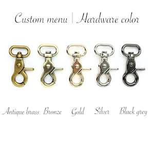 Pu&ograve; includere: Cinque chiusure metalliche di diversi colori, da sinistra a destra: ottone anticato, bronzo, oro, argento e grigio scuro. Menu personalizzato | Colore dell'hardware.